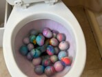 The video drew swift backlash, with many criticising the egg-dyeing method as bizarre and unsanitary.