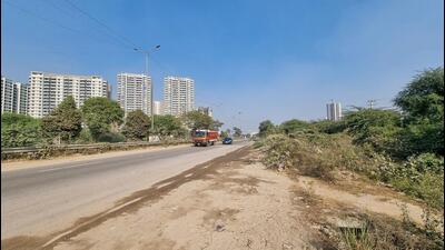 A road in dilapidated condition leading to severe dust pollution in Sector 109, according to locals. (HT Photo) A road in dilapidated condition leading to severe dust pollution in Sector 109, according to locals. (HT Photo)