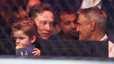 Businessman and Senior Advisor to the President of the United States Elon Musk's son sits on his lap as the father-son duo attend UFC 314 at Kaseya Center on April 12, 2025 in Miami, Florida. (Getty Images via AFP) Businessman and Senior Advisor to the President of the United States Elon Musk's son sits on his lap as the father-son duo attend UFC 314 at Kaseya Center on April 12, 2025 in Miami, Florida. (Getty Images via AFP)