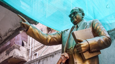 An artist gives the final touch to a statue of Dr. Bhimrao Ramji Ambedkar ahead of Ambedkar Jayanti, at a workshop in Nagpur on Saturday. (Chandrakant Paddhane) An artist gives the final touch to a statue of Dr. Bhimrao Ramji Ambedkar ahead of Ambedkar Jayanti, at a workshop in Nagpur on Saturday. (Chandrakant Paddhane)