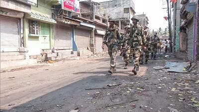 BSF personnel conduct a march after violence erupted on April 11 during a protest against the Waqf Amendment Act, in Murshidabad on Sunday. (ANI) BSF personnel conduct a march after violence erupted on April 11 during a protest against the Waqf Amendment Act, in Murshidabad on Sunday. (ANI)