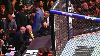 Trump speaks with CEO of Ultimate Fighting Championship Dana White as they sit with Elon Must to watch a fight during UFC 314 at the Kaseya Center in Miami, Florida, on April 12, 2025. (AFP) Trump speaks with CEO of Ultimate Fighting Championship Dana White as they sit with Elon Must to watch a fight during UFC 314 at the Kaseya Center in Miami, Florida, on April 12, 2025. (AFP)
