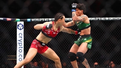 Yan Xiaonan of China and Virna Jandiroba of Brazil fight in a strawweight bout during the UFC 314 event at Kaseya Center on April 12, 2025 in Miami, Florida. Megan Briggs/Getty Images/AFP (Photo by Megan Briggs / GETTY IMAGES NORTH AMERICA / Getty Images via AFP) (Getty Images via AFP) Yan Xiaonan of China and Virna Jandiroba of Brazil fight in a strawweight bout during the UFC 314 event at Kaseya Center on April 12, 2025 in Miami, Florida. Megan Briggs/Getty Images/AFP (Photo by Megan Briggs / GETTY IMAGES NORTH AMERICA / Getty Images via AFP) (Getty Images via AFP)