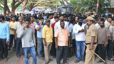 People protest amid protests over an alleged kidnapping and killing of a 5-year-old girl child at Hubballi, in Dharwad district, Karnataka, on Sunday. (PTI) People protest amid protests over an alleged kidnapping and killing of a 5-year-old girl child at Hubballi, in Dharwad district, Karnataka, on Sunday. (PTI)