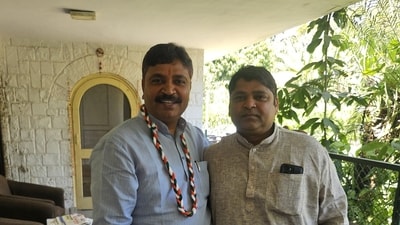 Tikaram Jully with a supporter. (X/ Avdesh Diwakar Bairwa) Tikaram Jully with a supporter. (X/ Avdesh Diwakar Bairwa)