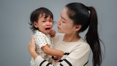 Women naturally tend to infants in distress. (Shutterstock) Women naturally tend to infants in distress. (Shutterstock)
