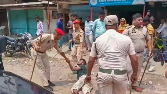 Police baton-charge protesters during a demonstration over the Waqf Act in Silchar. (PTI)