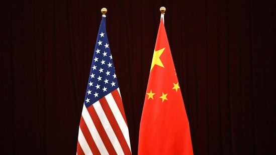 This photo shows a gerenal view of China's and USA's flags during a meeting between US Treasury Secretary Janet Yellen and China's Vice Premier He Lifeng at the Guangdong Zhudao Guest House in the southern Chinese city of Guangzhou. (AFP)