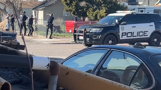 In this image made from video, police are seen shortly before opening fire on a teen on the other side of a fence Saturday, April 5, 2025, in Pocatello, Idaho. (AP)