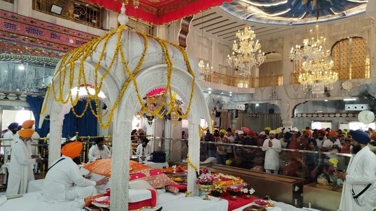 Devotees pray for blessings. The inner halls are decorated on the occassion of Baisakhi,&nbsp;