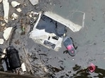 Debris of the NYHT-operated helicopter, that crashed in the Hudson River, floats in the water at the scene in Jersey City. Debris of the NYHT-operated helicopter, that crashed in the Hudson River, floats in the water at the scene in Jersey City.
