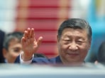Chinese President Xi Jinping waves as he arrives for a two-day state visit, at Hanoi's Noi Bai International Airport, Vietnam, April 14, 2025.