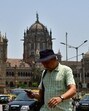 Mumbai, India – 09, April 2025: A man walk on the road side during the heat wave on a hot afternoon, at CST in Mumbai, India, on Wednesday, April 09, 2025. (Photo by Bhushan Koyande/HT Photo) Mumbai, India – 09, April 2025: A man walk on the road side during the heat wave on a hot afternoon, at CST in Mumbai, India, on Wednesday, April 09, 2025. (Photo by Bhushan Koyande/HT Photo)