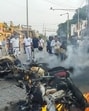 Police vehicles set on fire allegedly by members of Indian Secular Front (ISF) during a protest march to Kolkata over Waqf (Amendment) Act, at Bhangar in South 24 Parganas district, West Bengal, on Monday. (PTI)