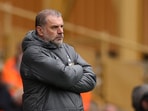 Tottenham Hotspur manager Ange Postecoglou looks on. 