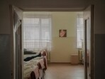 This photograph shows a room in the women's ward of the Poltava Regional Psychiatric Hospital, in Poltava. This photograph shows a room in the women's ward of the Poltava Regional Psychiatric Hospital, in Poltava.