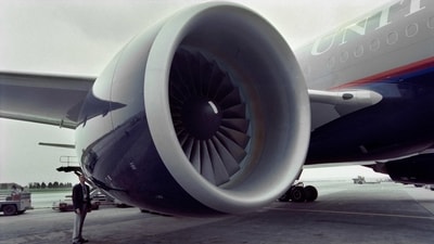 In this file photo an inspector for Pritt and Whitney engines, checks a United Airlines Boeing 777 after it made its inaugural flight from Heathrow Airport in London to Dulles International Airport, in Herndon, Virginia, near Washington on June 7, 1995. (Jawal A. Wilson/AFP) In this file photo an inspector for Pritt and Whitney engines, checks a United Airlines Boeing 777 after it made its inaugural flight from Heathrow Airport in London to Dulles International Airport, in Herndon, Virginia, near Washington on June 7, 1995. (Jawal A. Wilson/AFP)