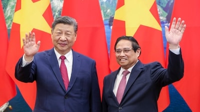 Chinese President Xi Jin Ping met Vietnam's prime minister during his tour of Southeast Asia. (AP) Chinese President Xi Jin Ping met Vietnam's prime minister during his tour of Southeast Asia. (AP)