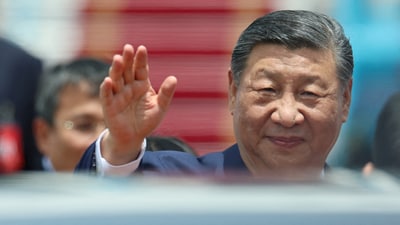 Chinese President Xi Jinping waves as he arrives for a two-day state visit, at Hanoi's Noi Bai International Airport, Vietnam, April 14, 2025. (Athit Perawongmetha/Reuters)