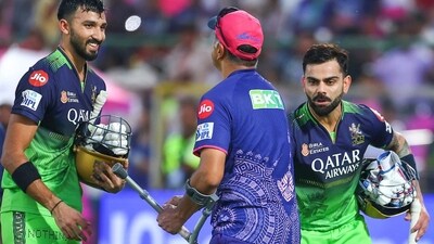 Rahul Dravid shook hands with Virat Kohli and other RCB stars after the match. (PTI Image) Rahul Dravid shook hands with Virat Kohli and other RCB stars after the match. (PTI Image)