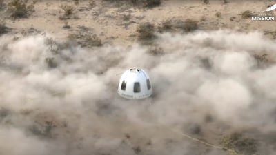 The capsule carrying Pop star Katy Perry and journalists Gayle King, Lauren Sanchez, who is also billionaire Jeff Bezos' fiance and other participants, at the moment it landed back on earth after blasting off into space on a Blue Origin rocket, as part of the New Shepard Mission NS-31, marking the first all-female flight crew in more than six decades, in West Texas, Texas, U.S., April 14, 2025. (via REUTERS)
