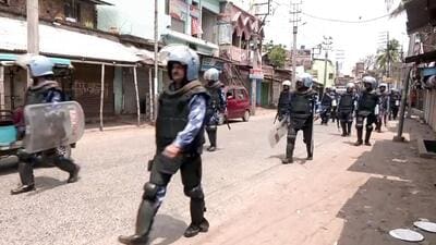 Security personnel conduct flag march at Dhuliyan of Jangipur subdivision after being deployed over the violence during a protest against Waqf (Amendment) Act in Murshidabad on Monday (ANI - X) Security personnel conduct flag march at Dhuliyan of Jangipur subdivision after being deployed over the violence during a protest against Waqf (Amendment) Act in Murshidabad on Monday (ANI - X)