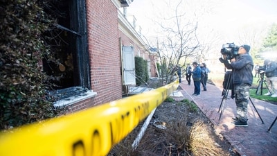 Journalists film fire damage at the Pennsylvania Governor's Mansion after a portion of the property was damaged in an arson fire on April 13, 2025 in Harrisburg, Pennsylvania. (Photo by Matthew Hatcher / GETTY IMAGES NORTH AMERICA / Getty Images via AFP) (Getty Images via AFP) Journalists film fire damage at the Pennsylvania Governor's Mansion after a portion of the property was damaged in an arson fire on April 13, 2025 in Harrisburg, Pennsylvania. (Photo by Matthew Hatcher / GETTY IMAGES NORTH AMERICA / Getty Images via AFP) (Getty Images via AFP)