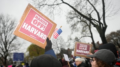 Demonstrators rally on Cambridge Common in a protest organized by the City of Cambridge calling on Harvard leadership to resist interference at the university by the federal government in Cambridge, Massachusetts, U.S. April 12, 2025. (REUTERS)