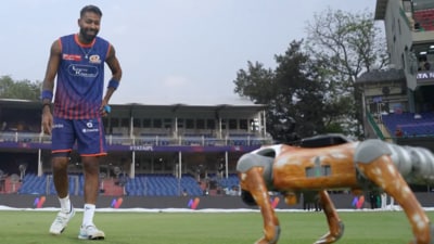 Mumbai Indians captain Hardik Pandya playing with the robot dog. (IPL/X) Mumbai Indians captain Hardik Pandya playing with the robot dog. (IPL/X)