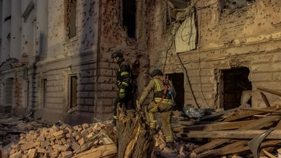 Ukrainian rescuers search rubbles at the site of a missile attack in Sumy, northeastern Ukraine, on April 13, 2025, amid the Russian invasion of Ukraine. (AFP) Ukrainian rescuers search rubbles at the site of a missile attack in Sumy, northeastern Ukraine, on April 13, 2025, amid the Russian invasion of Ukraine. (AFP)