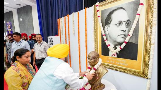 Punjab chief minister Bhagwant Mann garlands a bust of BR Ambedkar on his birth anniversary, in Patiala on Monday. (ANI)