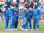 Indian cricketers celebrate