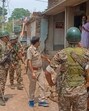 Police patrolling Samserganj villages in Murshidabad on Tuesday. (Sreyasi Pal)