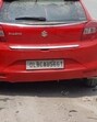 Police said the Delhi-based man’s body was found in a red Baleno car bearing registration number DL 8C AU 5661.