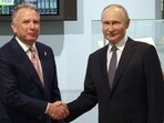 Russian President Vladimir Putin, right, and U.S. President Donald Trump's special envoy Steve Witkoff shake hands prior to their talks in St. Petersburg, Russia, Friday, April 11, 2025. 
