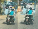 A video of two kids in a poultry cage on a bike went viral, sparking mixed reactions online. A video of two kids in a poultry cage on a bike went viral, sparking mixed reactions online.