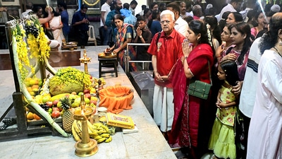 People from Malayali community offer prayers on the occasion of Vishukkani (Malayalam New Year), at Matunga's Asthika Samaj Kochu Guruvayoor Sree Ram Temple in Mumbai. (ANI) People from Malayali community offer prayers on the occasion of Vishukkani (Malayalam New Year), at Matunga's Asthika Samaj Kochu Guruvayoor Sree Ram Temple in Mumbai. (ANI)