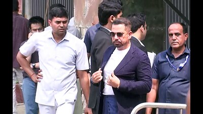 Businessman Robert Vadra reaches the Enforcement Directorate (ED) office after being summoned in connection with a Gurugram land case, in New Delhi on Tuesday. (ANI) Businessman Robert Vadra reaches the Enforcement Directorate (ED) office after being summoned in connection with a Gurugram land case, in New Delhi on Tuesday. (ANI)