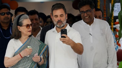 Rahul Gandhi and Sonia Gandhi take a selfie at a polling station during the sixth phase of the general election, in New Delhi. (REUTERS FILE)