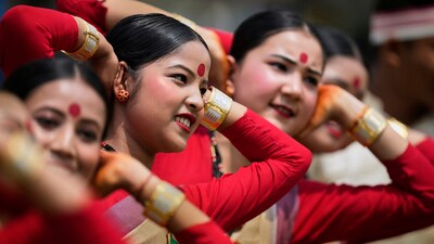 Bohag Bihu is celebrated on April 14 of each year, since it heralds the start of the Assamese New Year and the entrance of spring, Bihu is one of the most significant celebrations in Assam and the northeast. In pic: Assamese girls wearing traditional Mekhela Chadar perform the Bihu folk dance during the Rongali Bihu festival, organised by All Assam Students Union in Guwahati, capital of the north eastern state of Assam, India, (AP) Bohag Bihu is celebrated on April 14 of each year, since it heralds the start of the Assamese New Year and the entrance of spring, Bihu is one of the most significant celebrations in Assam and the northeast. In pic: Assamese girls wearing traditional Mekhela Chadar perform the Bihu folk dance during the Rongali Bihu festival, organised by All Assam Students Union in Guwahati, capital of the north eastern state of Assam, India, (AP)