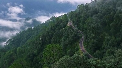 3. Lansdowne, Uttarakhand (Approx. 7 hours drive): The famous view of the Lansdowne road, as seen from the Tip ‘n’ Top viewing point. This peaceful hill station is a hidden gem near Delhi, with pine-covered hills, colonial charm and zero crowds. Great for nature walks and digital detox this Easter weekend. (File Photo) 3. Lansdowne, Uttarakhand (Approx. 7 hours drive): The famous view of the Lansdowne road, as seen from the Tip ‘n’ Top viewing point. This peaceful hill station is a hidden gem near Delhi, with pine-covered hills, colonial charm and zero crowds. Great for nature walks and digital detox this Easter weekend. (File Photo)