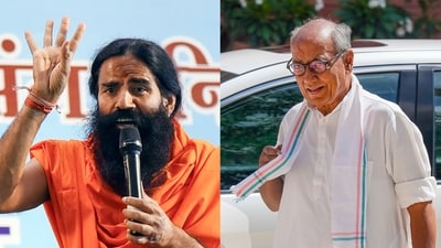Yoga guru Ramdev (L), Congress leader Digvijay Singh (R). Yoga guru Ramdev (L), Congress leader Digvijay Singh (R).