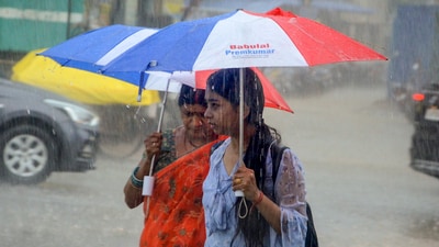 Commuters on a road amid rain in Ranchi on April 14, 2025. (PTI) Commuters on a road amid rain in Ranchi on April 14, 2025. (PTI)