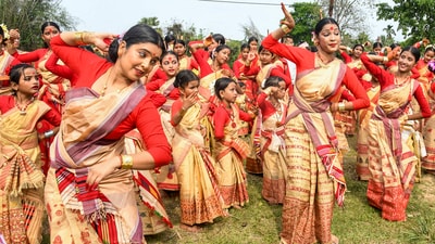 Women perform Bihu dance during Rongali Bihu celebrations, in Tezpur, Assam, Monday, April 14, 2025. (PTI) Women perform Bihu dance during Rongali Bihu celebrations, in Tezpur, Assam, Monday, April 14, 2025. (PTI)
