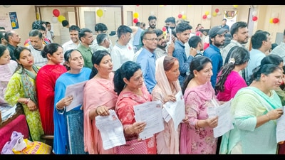 People wait in queues to register for the Amarnath Yatra 2025, in Jammu on Tuesday. (ANI)