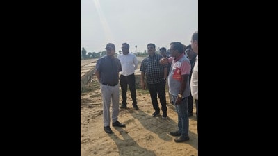 The emergency road is an integral part of the Jewar Airport connectivity plan, being developed to ensure swift access for emergency vehicles and services to and from the airport. (HT Photo) The emergency road is an integral part of the Jewar Airport connectivity plan, being developed to ensure swift access for emergency vehicles and services to and from the airport. (HT Photo)