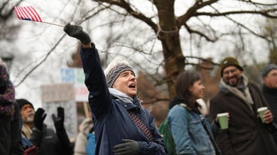 Demonstrators waved US flags, raised anti-trump slogans to resist interference at the university by the federal government in Cambridge, Massachusetts, U.S. April 12, 2025. REUTERS/Nicholas Pfosi (REUTERS)