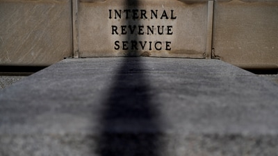 FILE PHOTO: A sign is seen at the U.S. Internal Revenue Service (IRS) building after it was reported the IRS will lay off about 6,700 employees, a restructuring that could strain the tax-collecting agency's resources during the critical tax-filing season, in Washington, D.C., February 20, 2025. REUTERS/Kent Nishimura/File Photo (REUTERS)