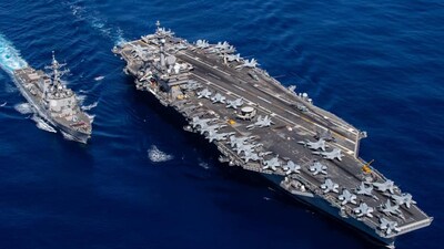 Ahead of the upcoming round of negotiations between the United States and Iran on Tehran's rapidly developing nuclear program, a second US aircraft carrier is in operation in Mideast waters. (AFP)