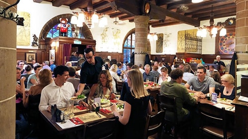 Communal dining beneath vaulted ceilings at the traditional Zeughauskeller.